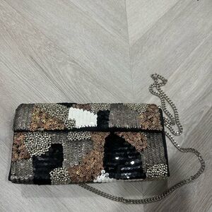Brand new sequin animal multi color print bag( still has paper inside of it)